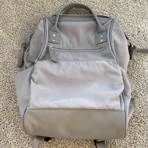 Multi pocket, tumi look alike back pack